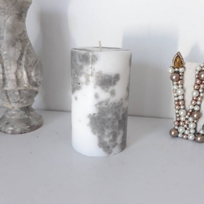 Grey and white decorative  candles. Pillar candles for home decor