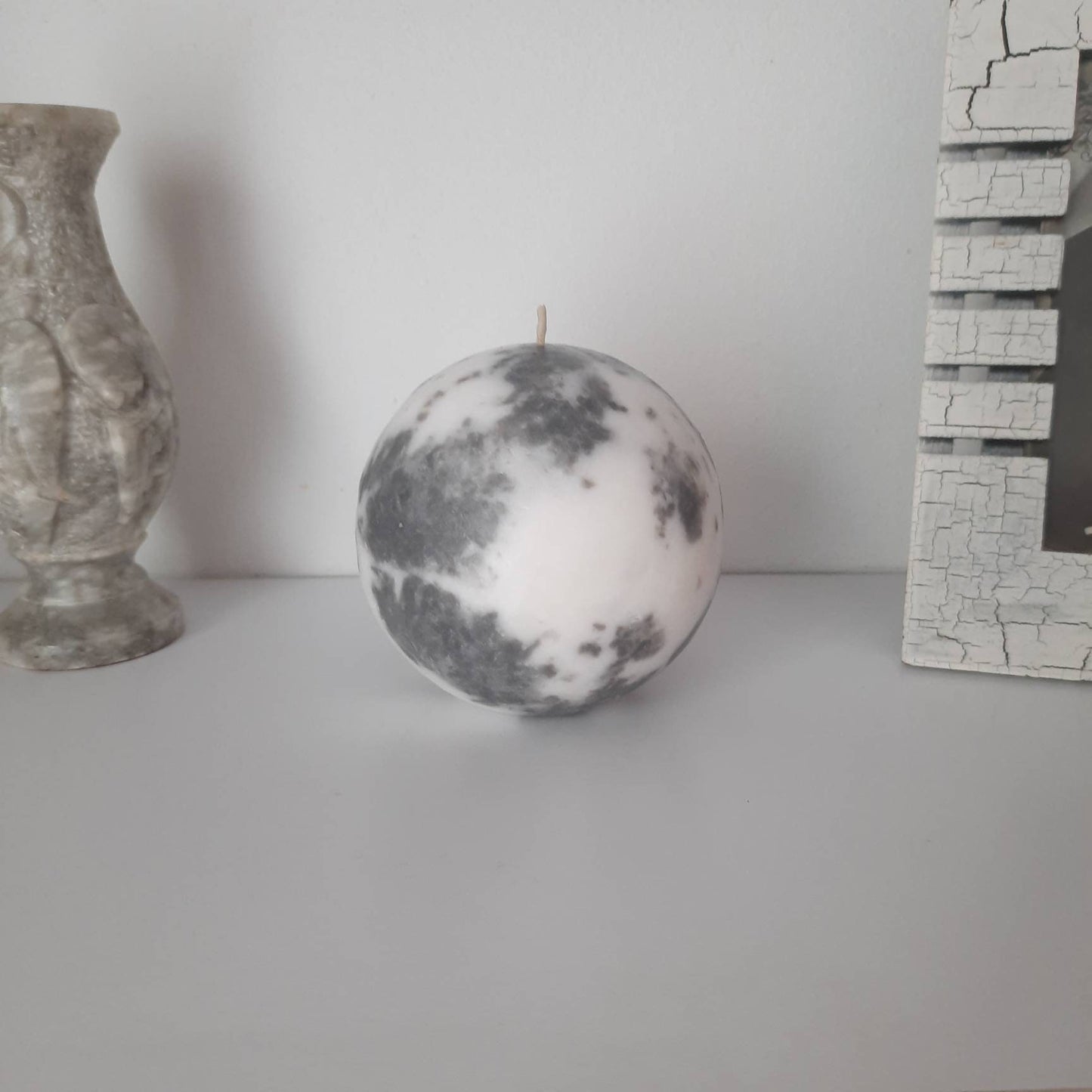 Grey and white decorative  candles. Pillar candles for home decor