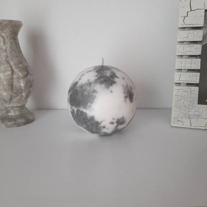 Grey and white decorative  candles. Pillar candles for home decor