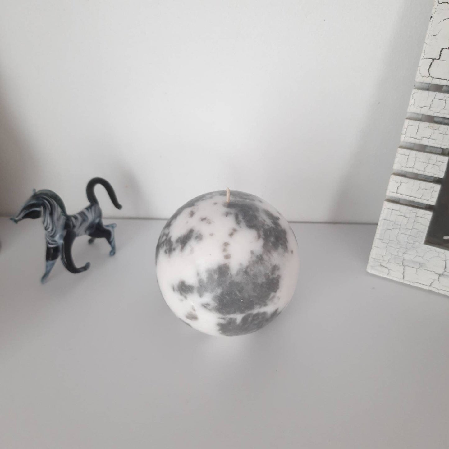 Grey and white decorative  candles. Pillar candles for home decor