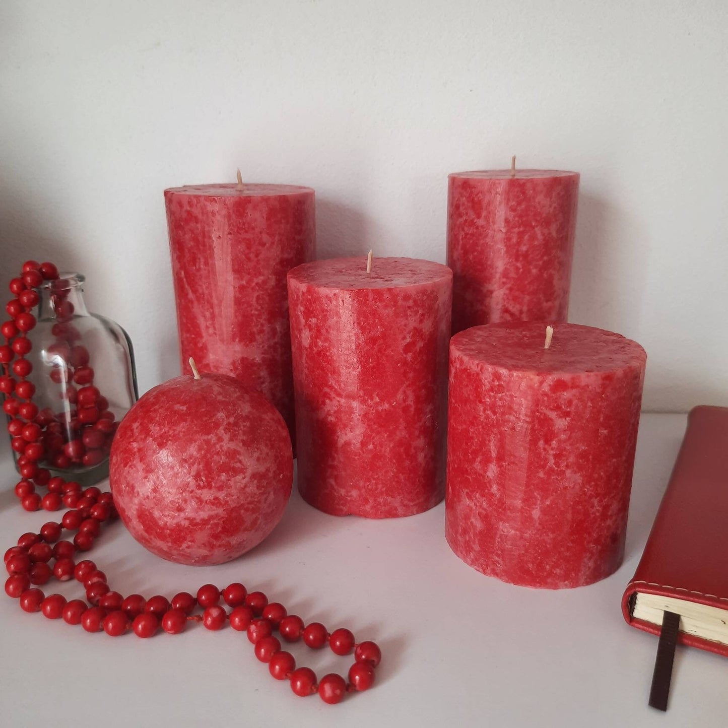 Red Pillar Candles. Decorative candles. Rose red candle. Unusual christmas candle